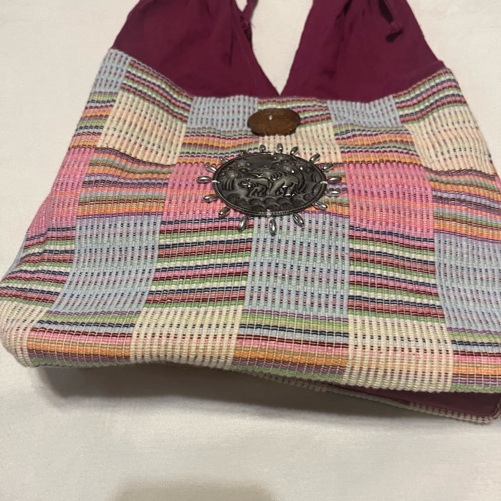 Handcrafted Woven Hobo Bag with Elephant Medallion - Picture 3 of 8